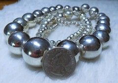 older,signed, grad. (4mm-24mm) Ball Bead Necklace