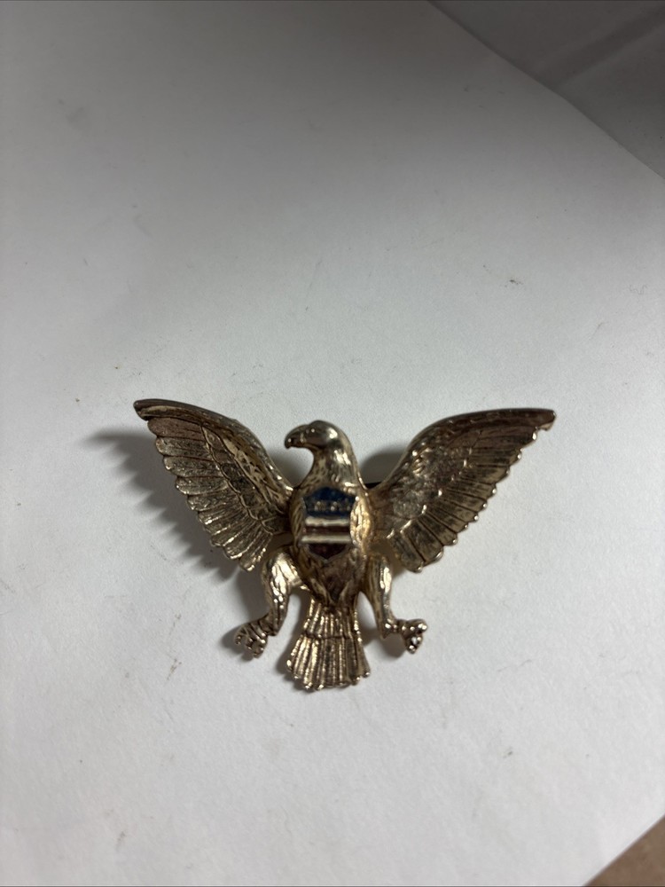 Vintage eagle brooch 1.5 Inches X 2 Inches Gold Colored With Red White And Blue