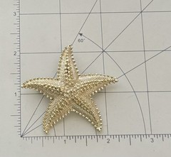 Vintage starfish brooch pin / brushed gold tone metal