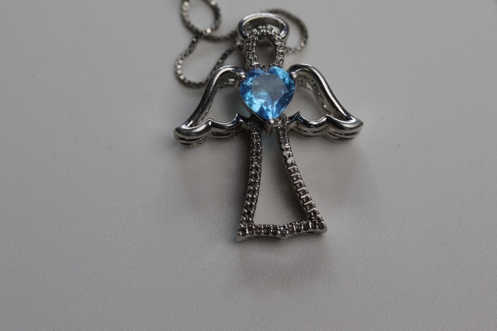 Blue and White Topaz Angel Pendant Necklace Sterling Silver