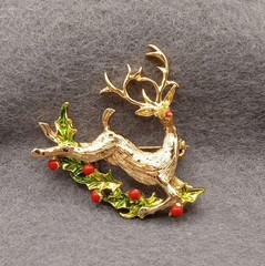 Flying Rudolph Reindeer Brooch, Gerrys brand, Gold tone enameled holly branches