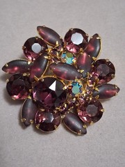 Purple plum prong set rhinestone brooch w/Aurora borealis accent stones, faceted