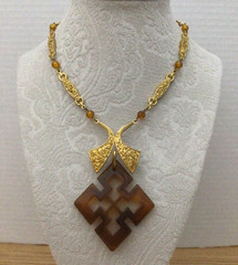 Quatrefoil Pendant Necklace Amber Color Lucite Metal Textured & Beaded Chain