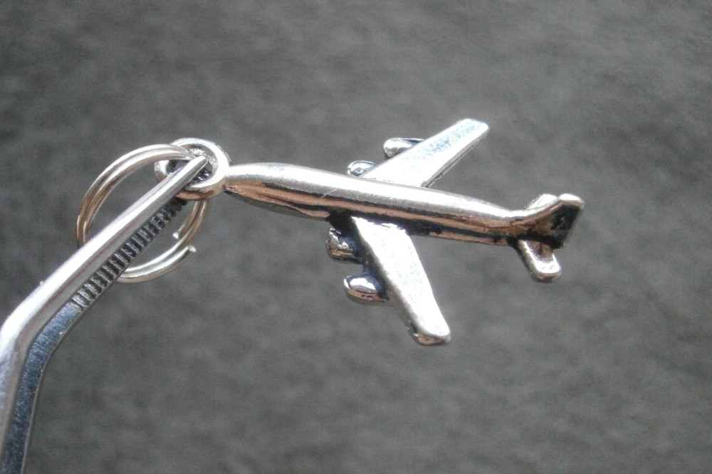 Four Engine Jet Airplane Plane Vintage Shiny Silvertone Charm Pendant 2.0g