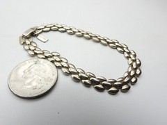 Signed Revlon Gold Tone Metal Train Track Bracelet Vintage