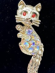 Bejeweled Feline Brooch Gold Tone With Man Made Aurora Borealis And Red Stones