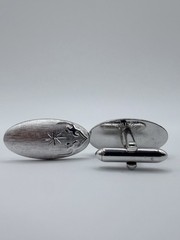 Swank Silver Tone Oval Metal Cufflinks Star Engraving Bullet Back