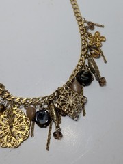 ✨VINTAGE✨ 16″ Ornate Gold Tone Dangling Necklace w/ Charms, Stones & Beads