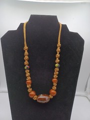 Glass Bead Necklace On Knotted Rope.