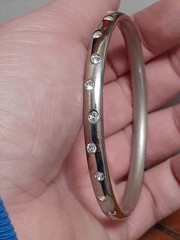 Crystal polka dot bangle bracelet Silvertone flush set stones eternity band