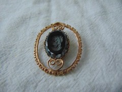vintage antique gold plated cut out carved hematite intaglio cameo brooch