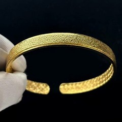 Golden Cuff Bangle Bracelet Gold-wash (NOT SURE) marked ‘999’, 7.5 in adjustable