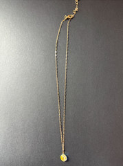 Swarovksi necklace with iridescent pendant on gold chain
