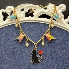 Poor Kitty Cat: Surrounded by Bird Charms On Vintage Chain Bracelet OOAK