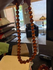 24 Inch long Vintage Graduating large bead Amber Necklace w matching clasp