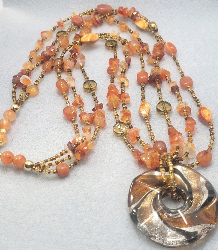 Multi-strand piece amber-toned Glass Gemstone Beads, large round pendant 26in.