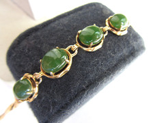 Vintage gold tone herringbone chain with 4 faux jade cab stones bracelet