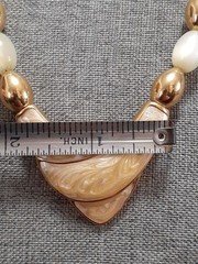 Napier champagne moonglow lucite bead necklace w/Chevron enamel pendant 24″