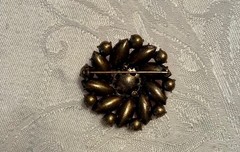 Vintage brooch, layers of rhinestones in shades of pink, machise settings