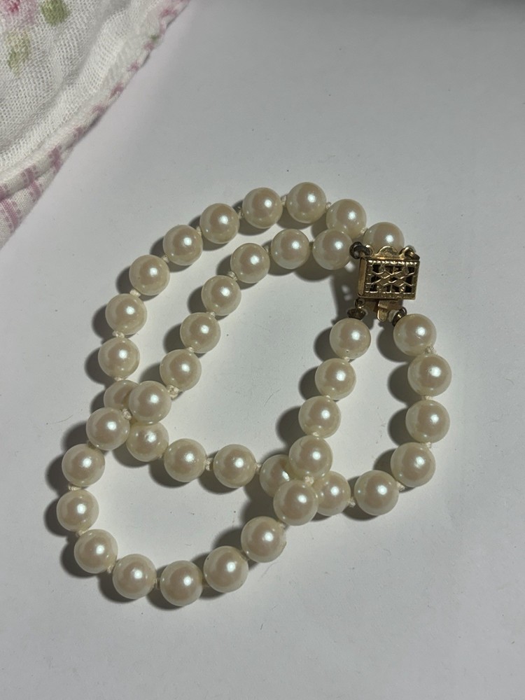 Woman’s Double Strand Pearl Bracelet Measuring 7 Inches Square Clasp Looks Gold