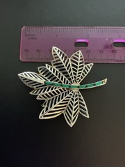 Vintage Signed Amerique Leaf Brooch Emerald Green Channel Set Stones