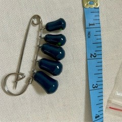 Authentic Russian matryoshka doll pin hand painted in Russia navy blue.
