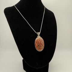 Vintage Fossilized Red Dinosaur Bone Cabochon Sterling Silver Pendant