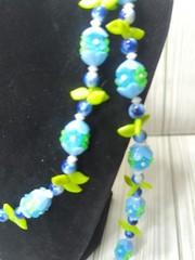 VTG Hong Kong costume jewelry necklace, specifically recognized by its clasp…