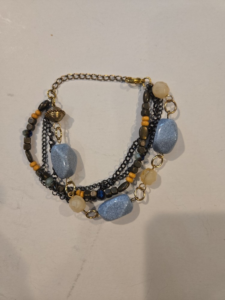 Vintage Gold Tone Multi Strand Bracelet With Blue, Wood, And Tan