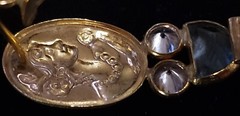 Vintage 18k gold earrings, three stones, with face portrait on it .16 otz