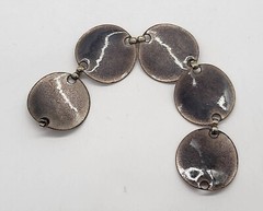 Vintage 7″ enamel on copper bracelet, round, bent sections, fold over clasp