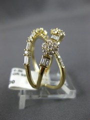 LARGE .99CT DIAMOND 14KT YELLOW GOLD ROUND & BAGUETTE MULTI FLOWER INFINITY RING