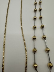 Pair Of Gold And Silver Tone Necklaces