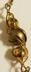 Vintage multi strand cage bead necklace in rich matte goldtone.