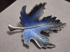 Maple leaf figural brooch, silvertone finish, blue ombre design