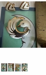 Vintage cream & gold enameled metal clip on earrings and swan brooch
