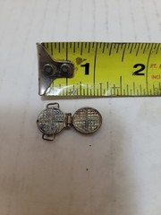 Vintage movable waffle iron sterling charm.