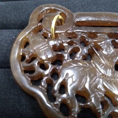 Carved Brown Stone Pendant Gold Tone