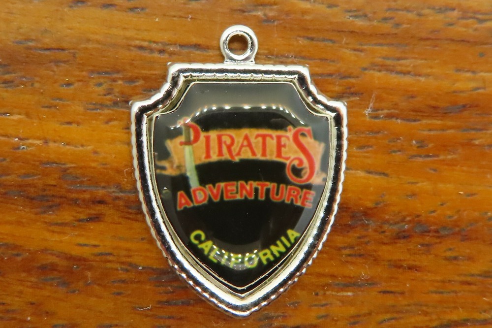 Vintage sterling silver PIRATES ADVENTURE CALIFORNIA TRAVEL SHIELD charm 20-27