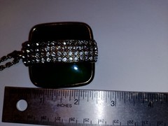 Nice faux jade gold tone necklace with strip of rhinestones. 19″ total 2″ stone