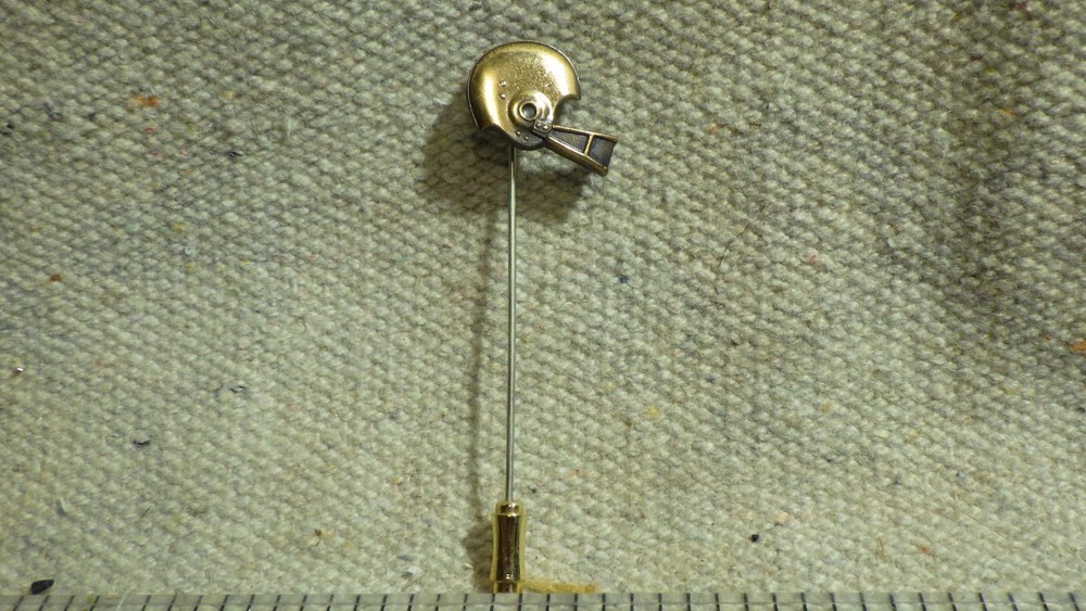 Vintage stick pin marked G.H. 79 football helmet 2 5/8″ gold color metal