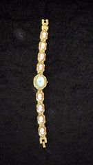 Women’s Gold Tone Cameo Bracelet Wristwatch Quartz Analog Oval Dress Watch