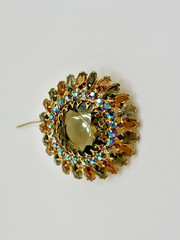 Vintage Unsigned Brown, Gray, and Aurora Borealis Round Brooch