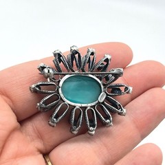 Vintage Austria Green Rhinestone Cabochon Sunburst Brooch Gunmetal Tone 1.5in
