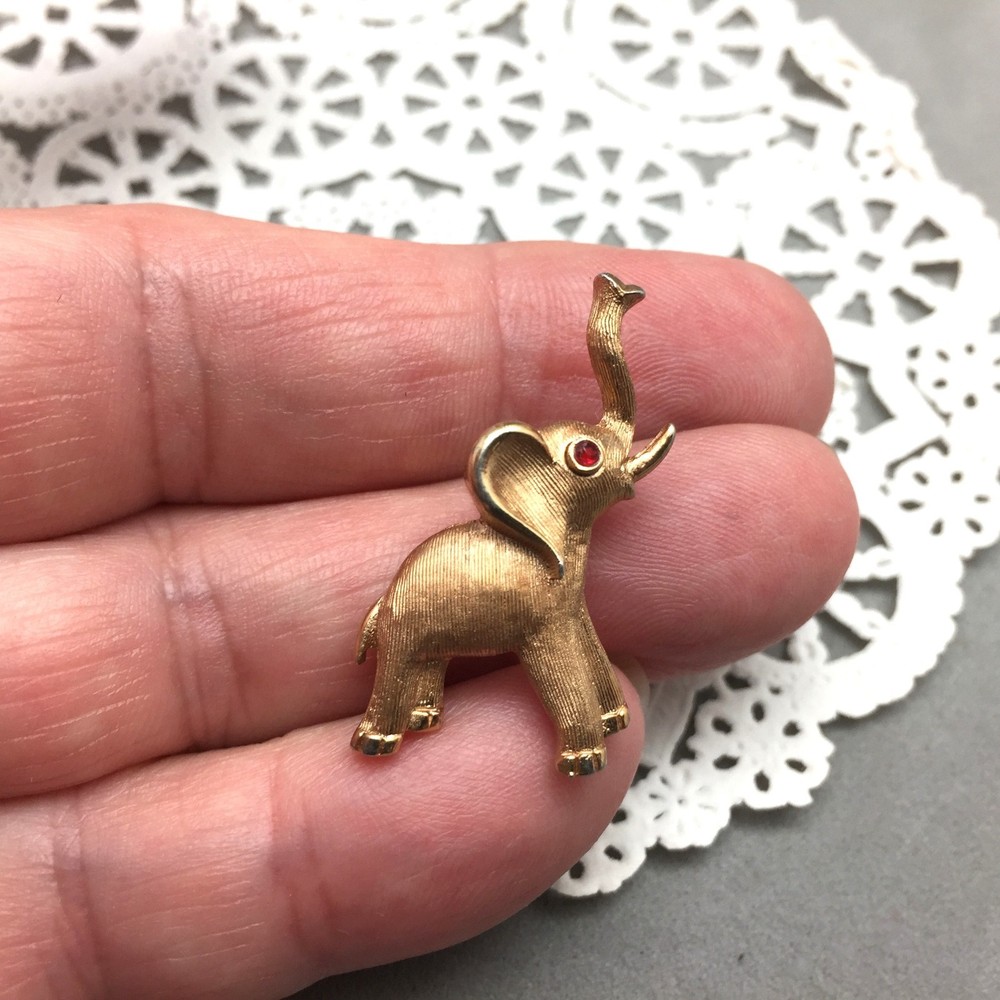 Trifari Gold Tone Elephant Brooch Pin Mini 1.25″ Red Rhinestone Eye Trunk UP Vtg