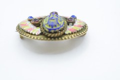Antique Egyptian Revival winged scarab brooch featuring vibrant enamel work