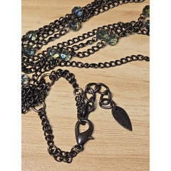 Layered Chain Necklace with Iridescent Beads and Tassel Charm