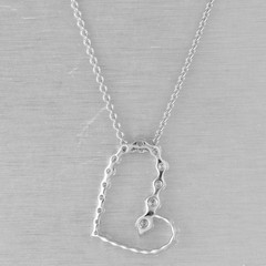 Movado 18k White Gold Diamond Asymmetrical Graduated Heart Necklace 0.60ctw 16″