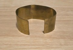 vintage mixed-metal cuff bracelet featuring S spiral design from 1950s-1970s.