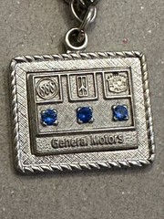1/20 12k GF General Motors Charm Bracelet White Gold Filled 71/4” 9.4 Grams